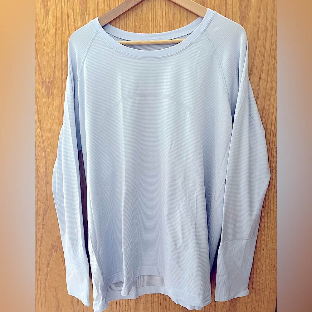 Swiftly Tech Long-Sleeve Shirt 2.0
Hip Length - Size 20